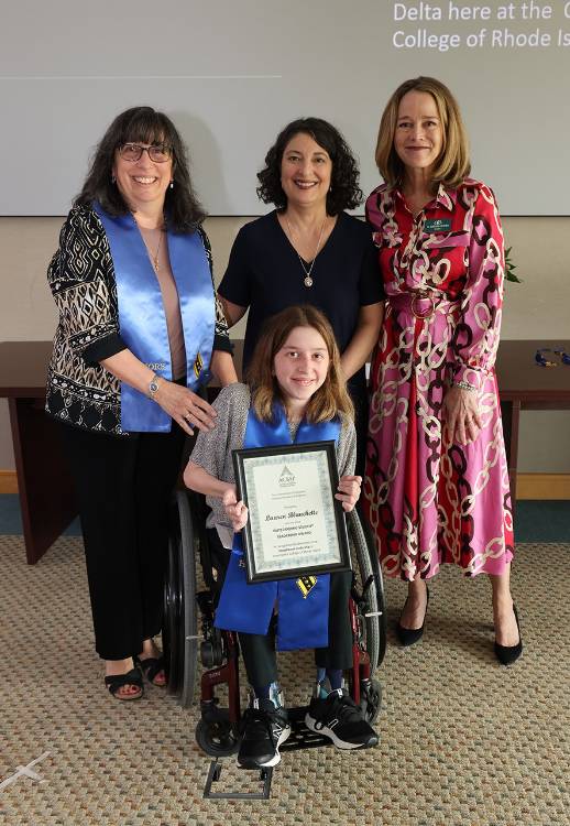 Lauren Blanchette receiving the award